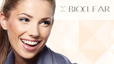 Smiling woman and BioClear logo